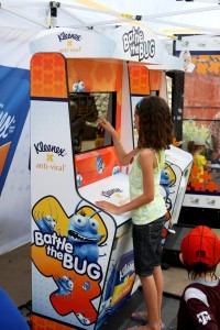 Sara plays "Battle the Bug" while learning facts about colds & flu