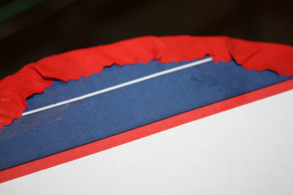https://www.amylovesit.com/wp-content/uploads/2009/11/063.jpg Fold the ends of the material over, and glue