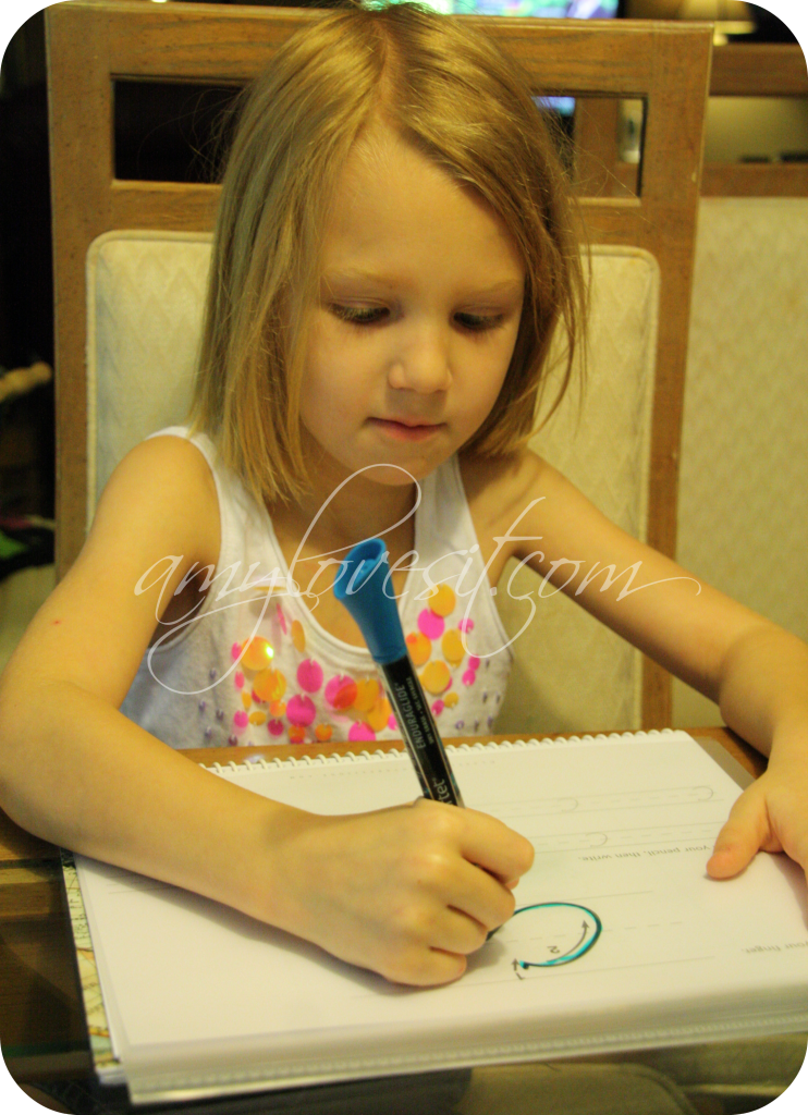 Reuse Homeschool Workbooks by Covering Sheets with a Report Cover