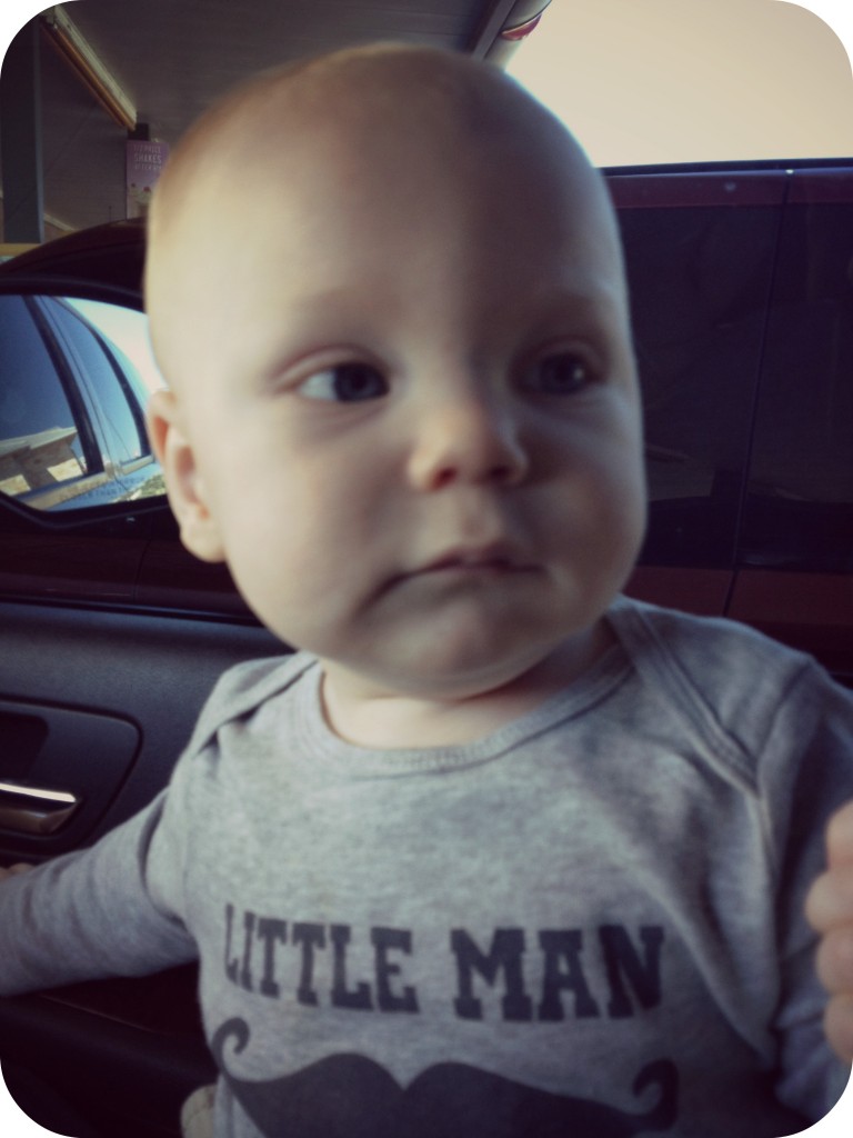 Little man in the front seat of our Tahoe